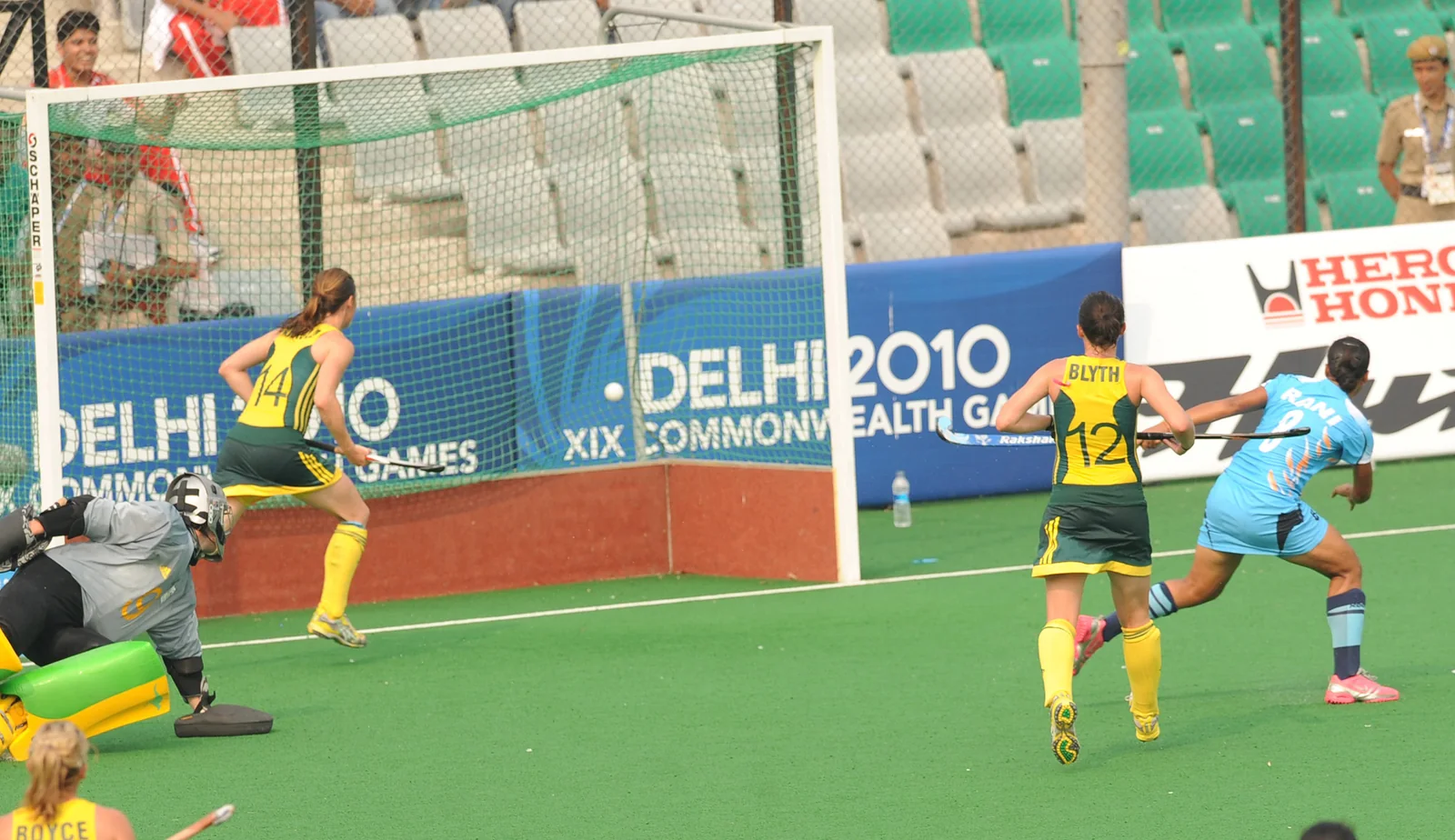 India attacking Australia during a women field hockey match